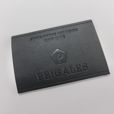 Los remiendos de encargo del cuero repujado, cuero de la PU etiquetan diseño de moda