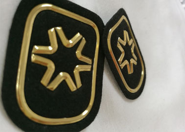 El negro y el oro grabaron en relieve las insignias de encargo del velcro de los remiendos del caucho 3D para Soprtswear