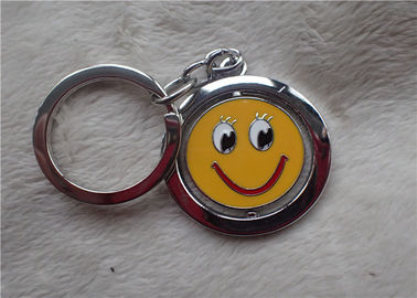 Regalos promocionales personalizados llavero de plata del color con la cara amarilla sonriente rotativa