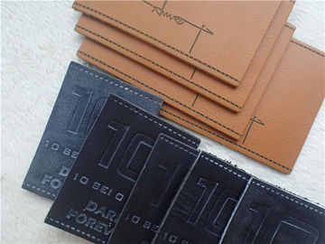 Eco - remiendos grabados en relieve cuero amistoso del logotipo de la PU para el color de Pantone de los vaqueros