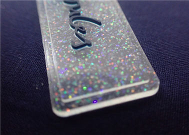 Insignia completamente transparente personalizada del PVC con el polvo colorido para la ropa