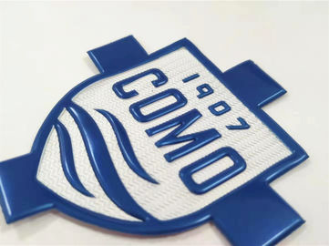 La aduana imprimió los remiendos suaves grabados en relieve de las etiquetas TPU del logotipo para la ropa de deportes
