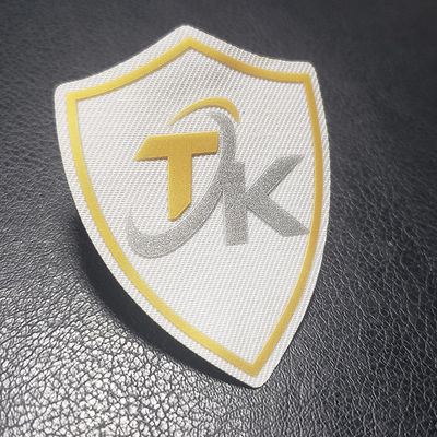 Camiseta suave grabada en relieve de Logo Iron On de la etiqueta de la transferencia de calor del silicón de la etiqueta engomada 3D TPU