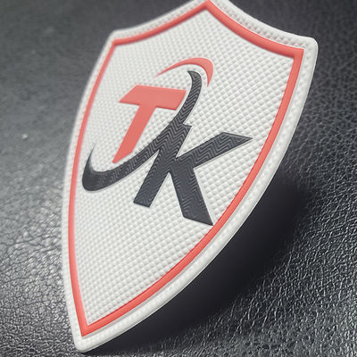 Transferencia termal de goma suave grabada en relieve impresa de encargo del remiendo 3D Tpu para el logotipo del paño