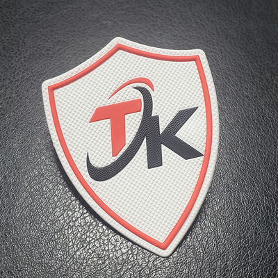 Transferencia termal de goma suave grabada en relieve impresa de encargo del remiendo 3D Tpu para el logotipo del paño