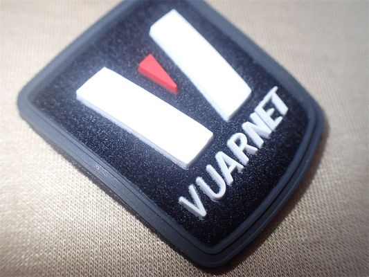 OEM 3D Clothing Label Micro Injection Badge Custom Logo On Fiber
