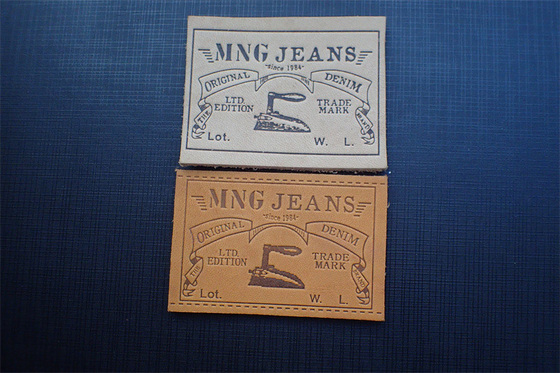 Las etiquetas amistosas de la parche de cuero de los vaqueros de Eco grabaron en relieve a Logo For Uniform