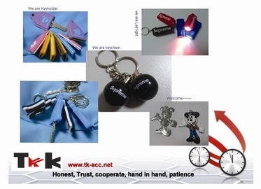 Los regalos promocionales personalizados novedad imprimieron llavero del PVC del logotipo con la luz del LED