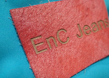 Etiquetas y etiquetas auténticas personalizadas del cuero repujado del logotipo del metal para la ropa